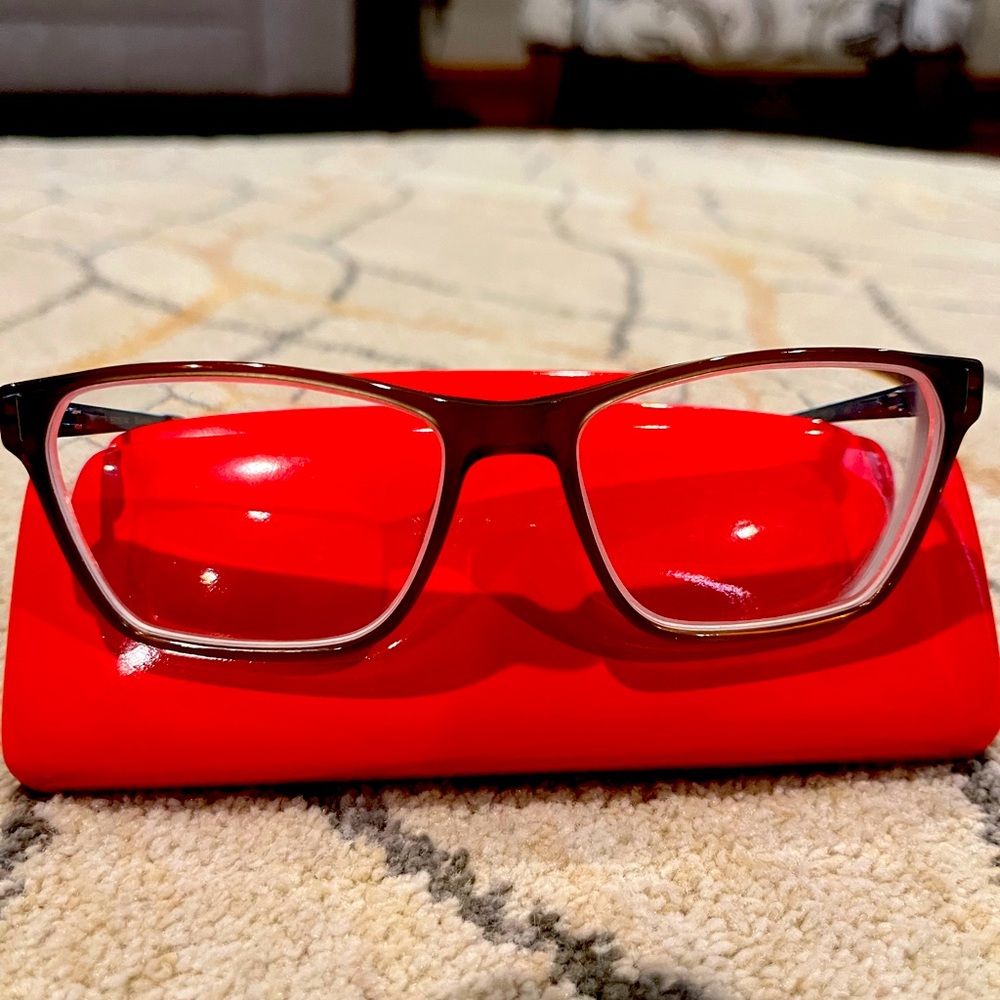 Elizabeth Arden 1192-1 eyeglasses frames w/teal earpiece.